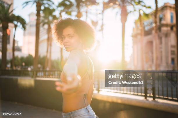 usa, nevada, las vegas, portrait of young woman in the city in backlight - temptation stock pictures, royalty-free photos & images