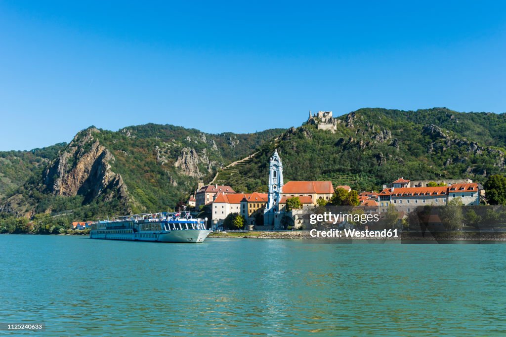 Austria, Wachau, Cruise ship passing Duernstein on the Danube