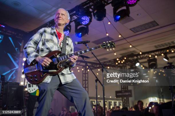 Guitarist Robby Krieger of The Doors performs on stage at the Gibson Guitars booth during the 2019 NAMM Show at Anaheim Convention Center on January...