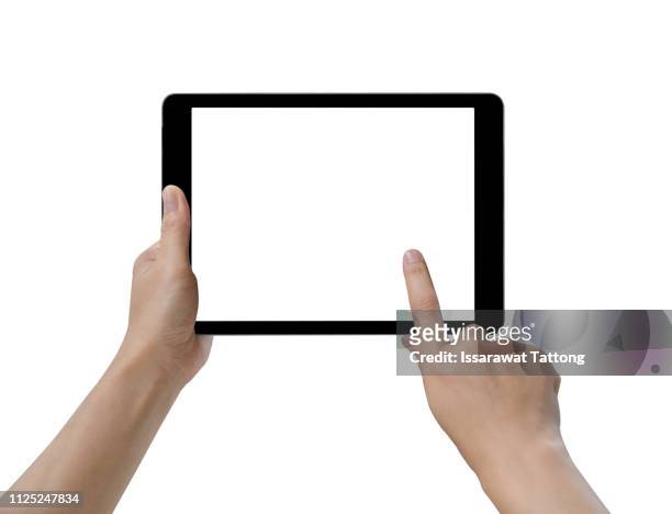 hands holding and touching on tablet pc isolated on white background - tablet pc stock-fotos und bilder
