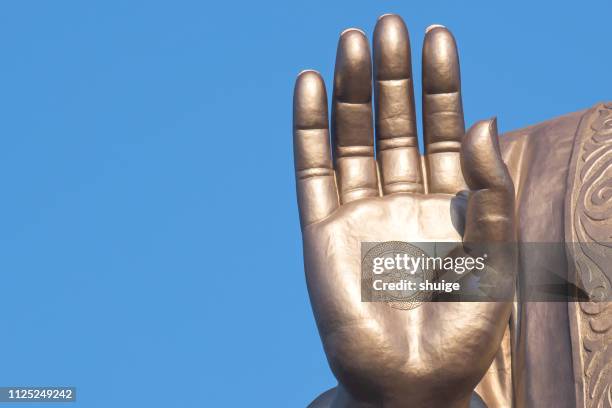 part of lingshan giant buddha - buddha hands stock-fotos und bilder