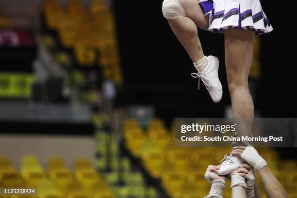 Team of Guangxi University, China performs in Group Stunts Mixed during Cheerleading World Championships 2011 Hong Kong at Hong Kong Coliseum in Hung...