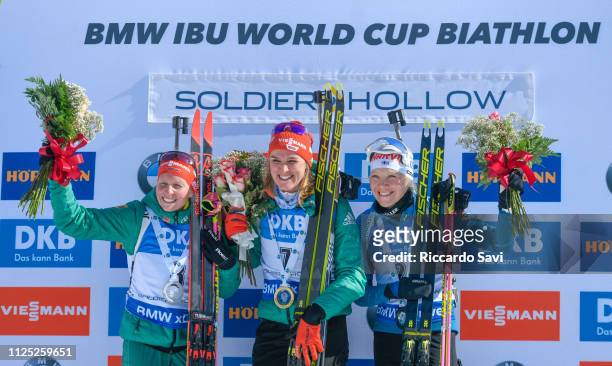 Franziska Hildebrand of Germany, Denise Herrmann of Germany, Kaisa Makarainen of Finland celebrate during the Women's 10 KM Pursuit Competition of...
