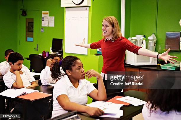 Emily Dodd, a teacher at M.S. 223, is photographed with students for New York Times Magazine on March 29, 2011 in the Bronx, New York. PUBLISHED...