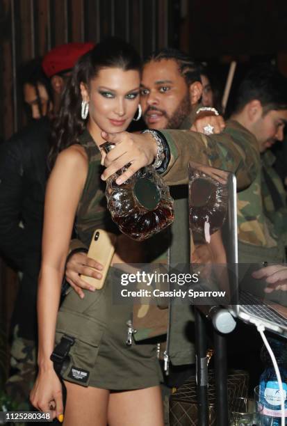 Bella Hadid and The Weeknd attend as The Weeknd celebrates his birthday at TAO Downtown with Remy Martin at TAO Downtown on February 15, 2019 in New...