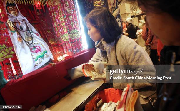 Day 2 of Kwun Yam Treasury Festival, a lot of people queue to borrow money from the Goddess of Mercy. Kwun Yam Temples in Tai Hang, 17Feb12.