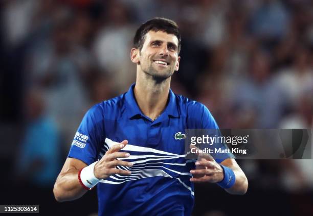Novak Djokovic of Serbia celebrates after winning championship point in his Men's Singles Final match against Rafael Nadal of Spain during day 14 of...