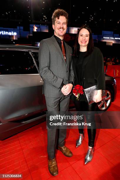 Jeffrey Bowers and Vanja Kaludjercic pose in front of Audi e-tron car for the closing ceremony of the 69th Berlinale International Film Festival...