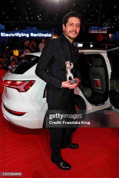 Claudio Giovannesi poses in front of Audi e-tron car for the closing ceremony of the 69th Berlinale International Film Festival Berlin at Berlinale...