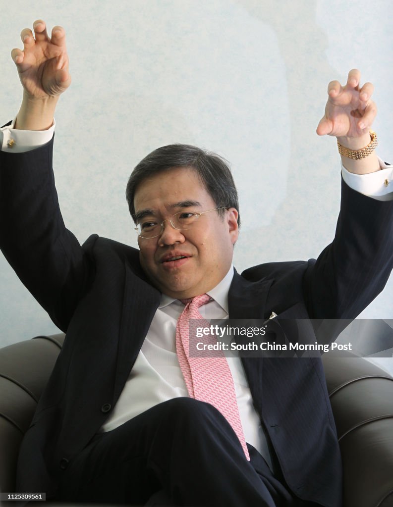 Hospital Authority chairman Anthony Wu Ting-yuk gestures during an interview. 22MAR12