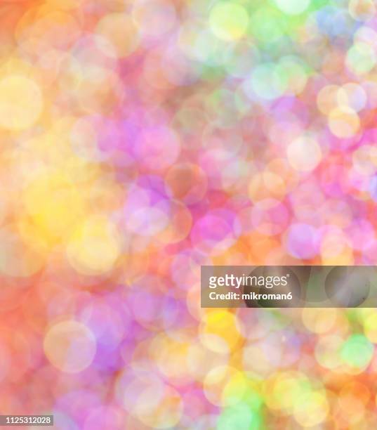 rainbow glitter - rainbow confetti stock pictures, royalty-free photos & images