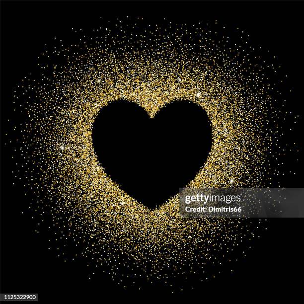 goldglitter mit herz form leeren raum auf schwarzem hintergrund - gold heart stock-grafiken, -clipart, -cartoons und -symbole