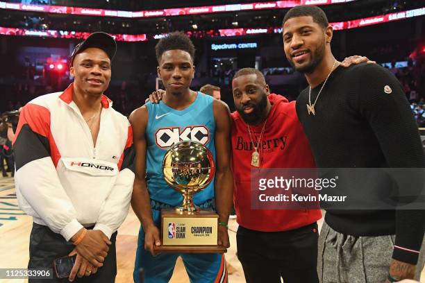 Russell Westbrook, Hamidou Diallo, Raymond Felton, and Paul George pose after the AT&T Slam Dunk during the 2019 State Farm All-Star Saturday Night...