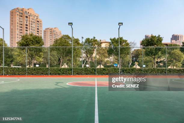 outdoor basketball court - spielfeld stock-fotos und bilder