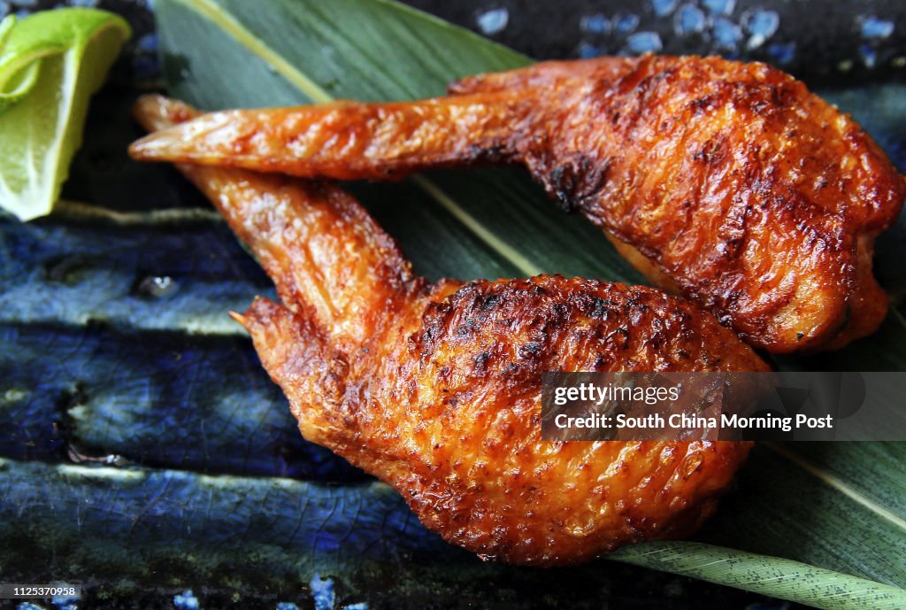 Grilled chicken wings stuffed with mentaiko at Hanagushi Yakitori Japanese Restaurant, M88, 2-8 Wellington Street, Central. 17JUL12