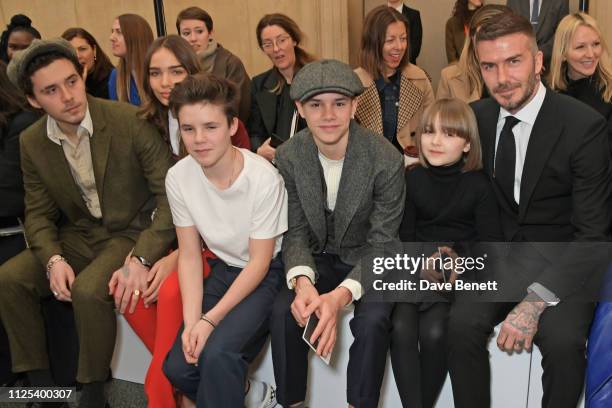 Brooklyn Beckham, Hana Cross, Cruz Beckham, Romeo Beckham, Harper Beckham and David Beckham attend the Victoria Beckham show during London Fashion...