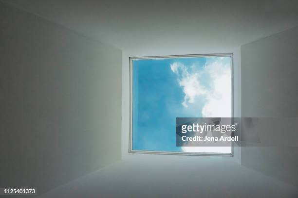 window with blue sky and clouds, vanishing point, diminishing perspective, skylight, conceptual symbol, freedom, hope, getting away from it all - skylight stock pictures, royalty-free photos & images