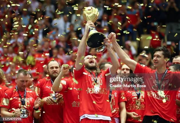 Mikkel Hansen of Denmark celebrates with the trophy after winning the 26th IHF Men's World Championship final between Norway and Denmark at Jyske...