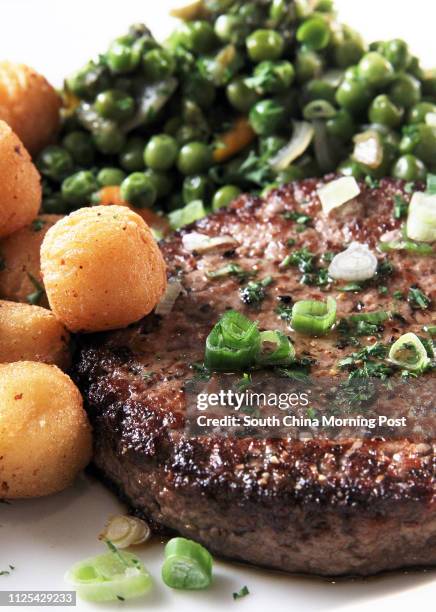 Steak hache with Pommes noisettes and Petits pois-carottes at La Cantoche restaurant, 227 Hollywood Road, Sheung Wan. 02NOV12