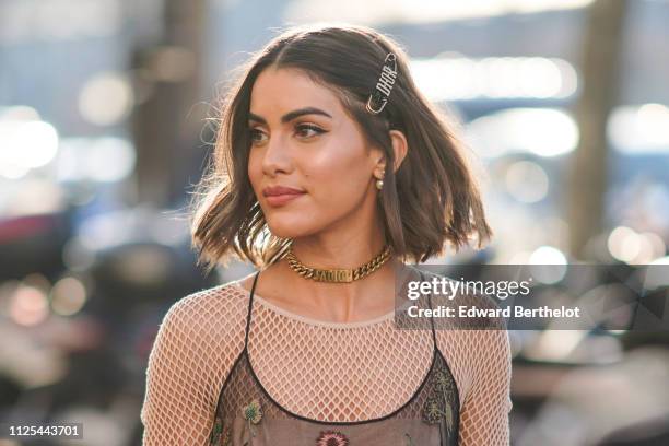 Camila Coelho is seen, outside Dior, during Paris Fashion Week - Haute Couture Spring Summer 2020, on January 21, 2019 in Paris, France.