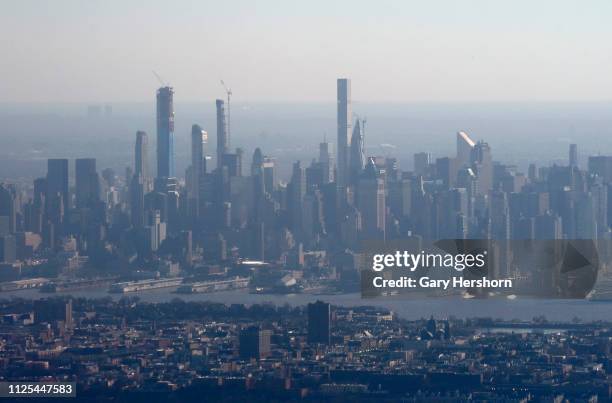 Residential towers under construction along the south end of Central Park including 220 Central Park South, Central Park Tower and 111 West 57th...