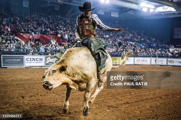 Brady Portenier of Caldwell Indiana competes in the El Paso County Colosseum during the Tuff Hedeman Bull Riding Tour on February 16, 2019. - About...