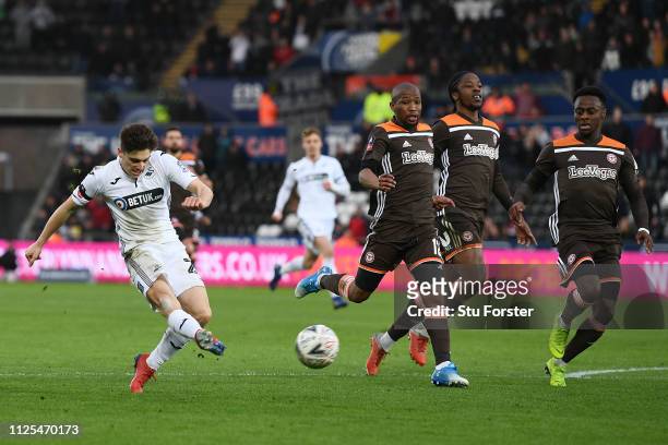 Daniel James of Swansea City scores his team's second goal during the FA Cup Fifth Round match between Swansea and Brentford at Liberty Stadium on...