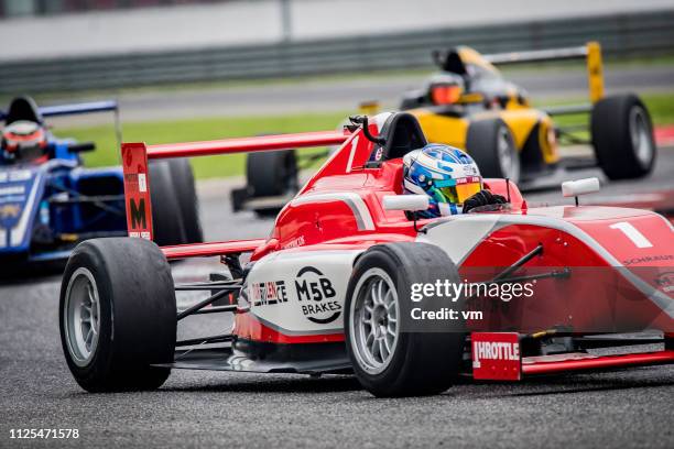 formula race - race car driver stock pictures, royalty-free photos & images