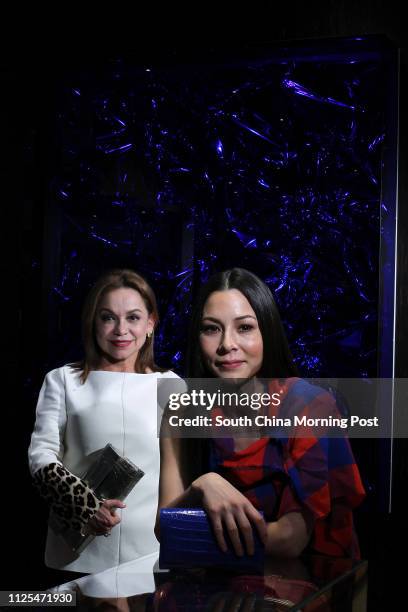 Portrait of precious skin handbag designer Nancy Gonzalez and British actress and model China Chow , at Nancy Gonzalez boutique, IFC mall, Central....