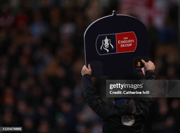 View of the substitutes board showing the FA Cup logo on during the FA Cup Fourth Round match between Shrewsbury Town and Wolverhampton Wanderers at...