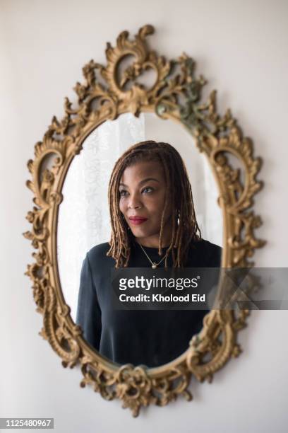 Portrait of black businesswoman with dreadlocks