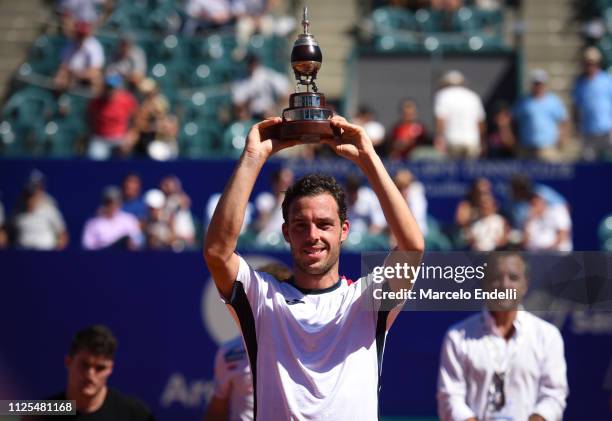 Marco Cecchinato of Italy lifts the trophy after winning the Argentina Open ATP 250 against Diego Schwarztman of Argentina during the final day of...