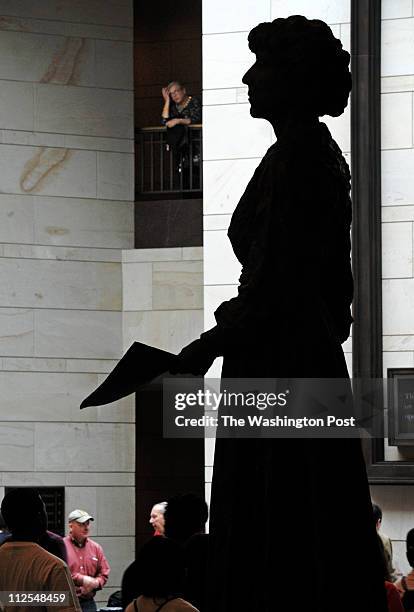 Statue of Jeannette Rankin, first woman elected to Congress, stands in Emancipation Hall, but statues of men far outnumber women in the US Capitol...