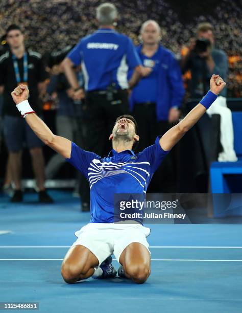Novak Djokovic of Serbia celebrates at match point in his Men's Singles Final match against Rafael Nadal of Spain during day 14 of the 2019...