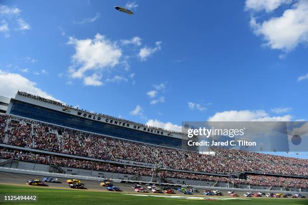 William Byron, driver of the Axalta Chevrolet, and Alex Bowman, driver of the Nationwide Chevrolet, lead the field to the green flag to start the...