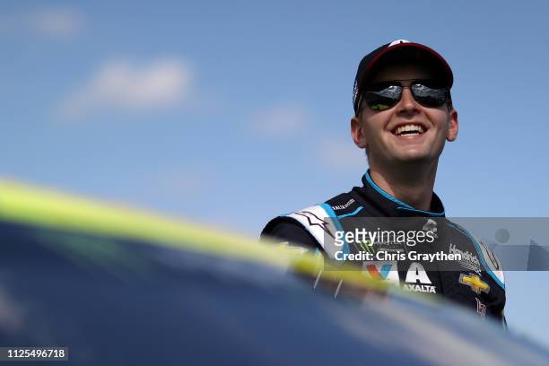 William Byron, driver of the Axalta Chevrolet, stands on the grid prior to the start of the Monster Energy NASCAR Cup Series 61st Annual Daytona 500...
