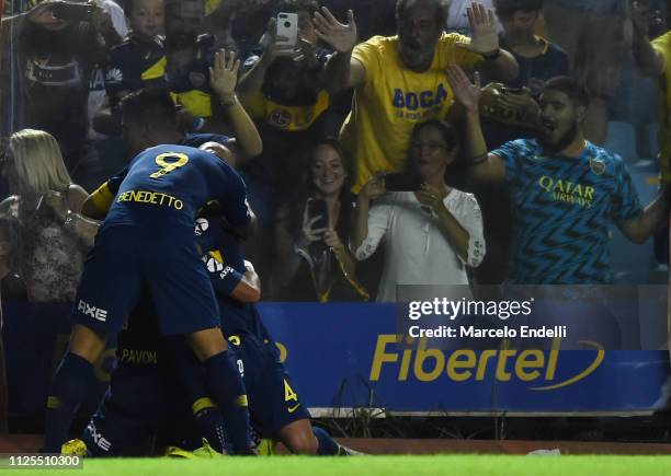 Mauro Zarate of Boca Juniors celebrates with teammates after scoring the second goal of his team during a match between Boca Juniors and Lanus as...