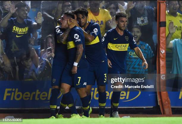 Mauro Zarate of Boca Juniors celebrates with teammates after scoring the second goal of his team during a match between Boca Juniors and Lanus as...