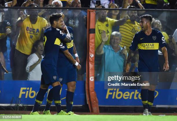 Mauro Zarate of Boca Juniors celebrates with teammates after scoring the second goal of his team during a match between Boca Juniors and Lanus as...