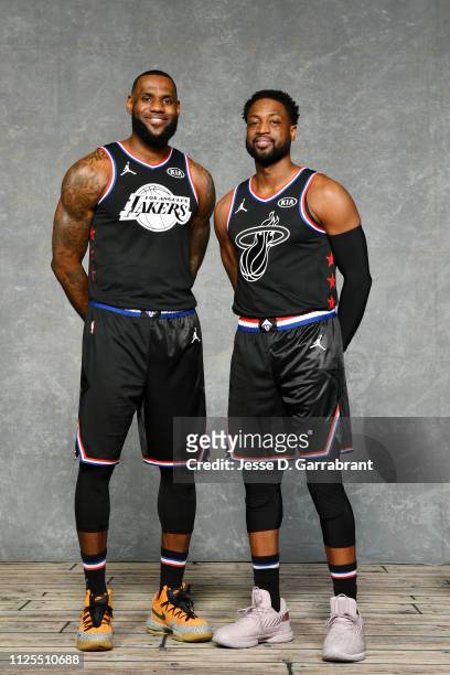 LeBron James and Dwyane Wade of Team LeBron pose for a portrait prior to the 2019 NBA All Star Game on February 17, 2019 at Spectrum Center in...