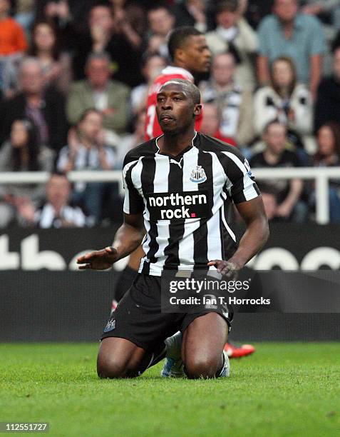 Shola Ameobi of Newcastle United reacts during the Barclays Premier League match between Newcastle United and Manchester United at St James' Park on...