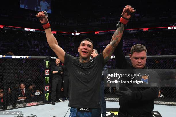 Andre Fili celebrates his victory over Myles Jury in their featherweight bout during the UFC Fight Night event at Talking Stick Resort Arena on...