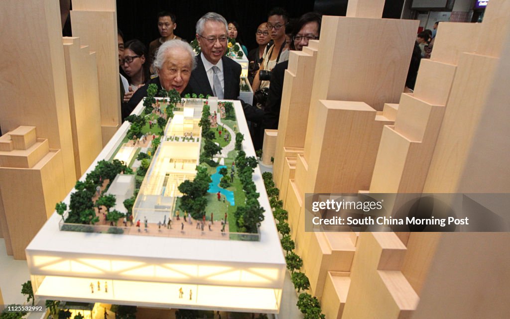 Arata Isozaki (L) looks at a model of Central Oasis, a revitalisation project on Central Market. 24MAY13