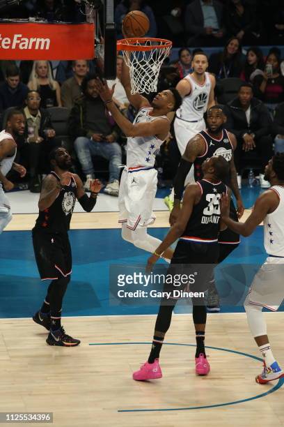 Giannis Antetokounmpo of Team Giannis shoots against Kyrie Irving, Kevin Durant and LeBron James of Team LeBron during the 2019 NBA All-Star Game on...