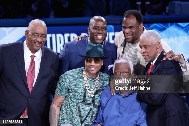 George Gervin, Magic Johnson, Allen Iverson, Bill Russell, Dave Robinson, and Julius Erving attend the 68th NBA All-Star Game at Spectrum Center on...