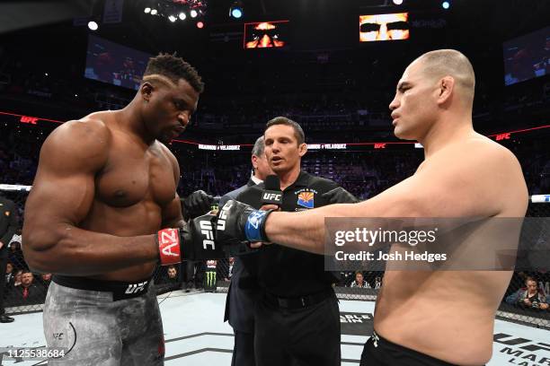 Francis Ngannou of Cameroon and Cain Velasquez touch gloves prior to their heavyweight bout during the UFC Fight Night event at Talking Stick Resort...