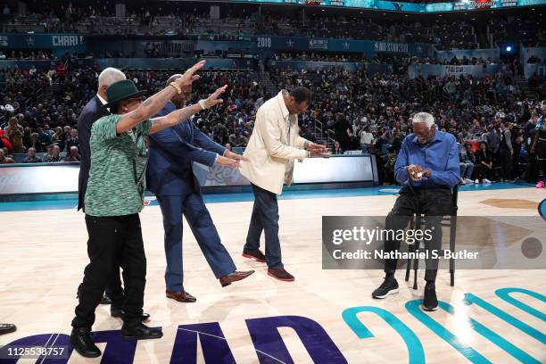 Former NBA Legends, Magic Johnson, David Robinson, Julius Erving, and Allen Iverson honor Bill Russell during the 2019 NBA All-Star Game on February...
