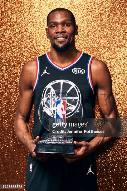 Kevin Durant of Team LeBron poses with the MVP trophy after the 2019 NBA All-Star game on February 17, 2019 at the Spectrum Center in Charlotte,...