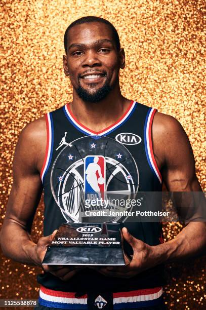 Kevin Durant of Team LeBron poses with the MVP trophy after the 2019 NBA All-Star game on February 17, 2019 at the Spectrum Center in Charlotte,...
