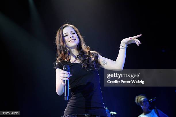 Lena Meyer-Landrut performs on stage at the Westfalen Stadium on April 19, 2011 in Dortmund, Germany.